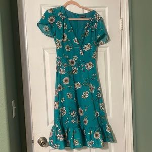 Turquoise blue unique vintage dress (discontinued).Slightly worn